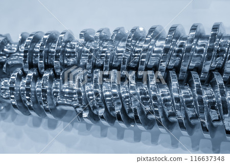 Close up scene group of the barrel screw of injection machine spare parts. Close up scene group of the barrel screw of injection machine spare parts. 116637348