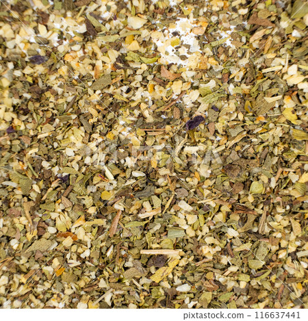 Herb blend seasoning of oregano, basil, onion, garlic and thyme, macro, top view. 116637441
