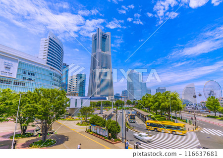 Yokohama cityscape in Japan: A view of the Minato Mirai area, including Yokohama Landmark Tower under the summer sky from Sakuragicho Station Yokohama cityscape in Japan: A view of the Minato Mirai area, including Yokohama Landmark Tower under the summer sky from Sakuragicho Station 116637681