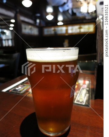 Drinking beer (ale) in an English pub Drinking beer (ale) in an English pub 116638521