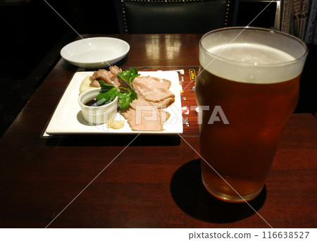 Drinking beer (ale) in an English pub Drinking beer (ale) in an English pub 116638527