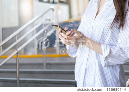 A woman controls various devices . 116639344