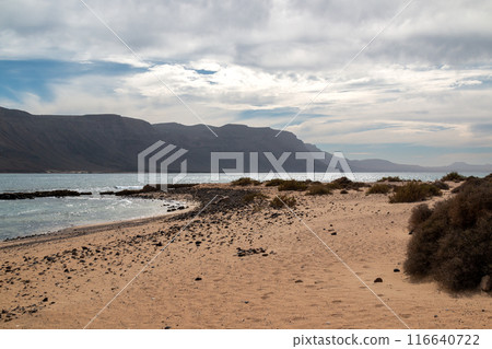 Cliffs of Lanzarote from La Graciosa, Spain 116640722