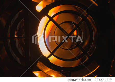 A lighthouse lamp with a Fresnel lens, close up A lighthouse lamp with a Fresnel lens, close up 116640882