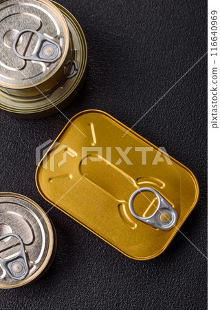 Metal can with canned meat or fish with a key to open it Metal can with canned meat or fish with a key to open it 116640969