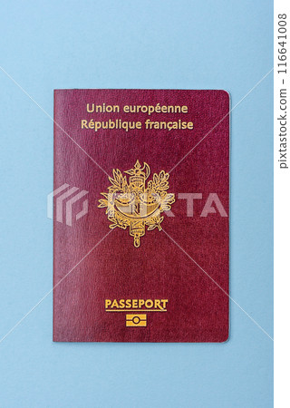 Passport of the Republic of France on a blue background Passport of the Republic of France on a blue background 116641008