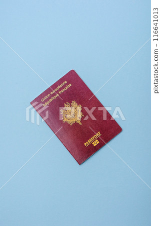 Passport of the Republic of France on a blue background Passport of the Republic of France on a blue background 116641013