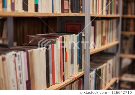 Book shelves in a library 116642710