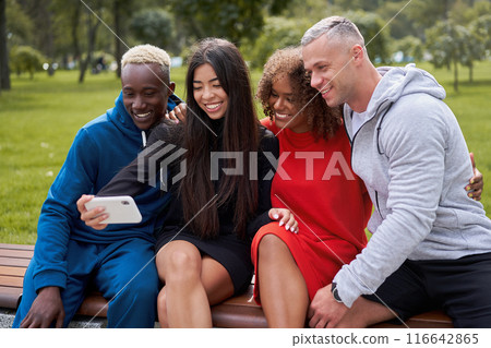 Happy diverse friends taking selfie using Happy diverse friends taking selfie using 116642865