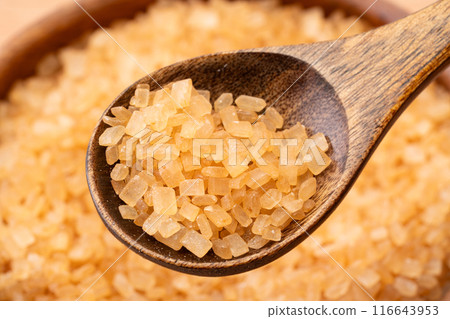 Brown sugar scooped with a spoon Brown sugar scooped with a spoon 116643953