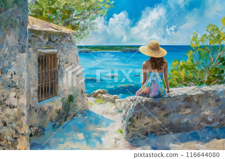 Young woman looking at the sea in summer 116644080