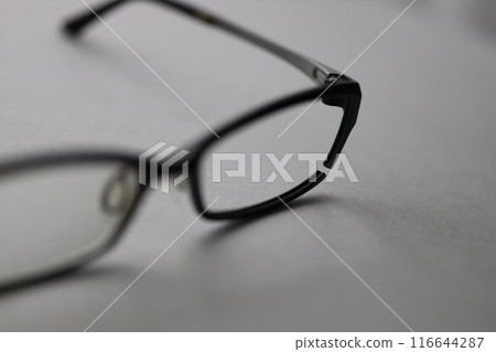 Glasses with broken frames 116644287