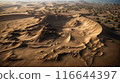 Aerial view of intricate sand formations in a vast desert 116644397