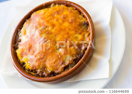 Baked minced meat with cheese Baked minced meat with cheese 116644699
