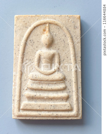 Thai old buddha amulet on the background 116644884