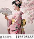 A woman in a long-sleeved kimono holding a folding fan 116646322