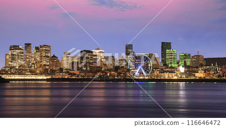 Montreal skyline and St Lawrence River at dusk with pink sky background, Quebec, Canada 116646472