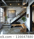 The office waiting room in a loft setting features a stylish staircase alongside a rustic wooden bench 116647880