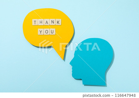Thank you, the word is laid out from letters on a blue background. 116647948