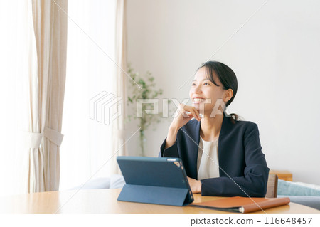 Woman doing work at home 116648457