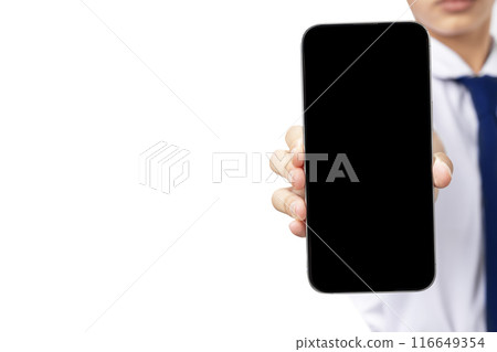 A girl is holding a black phone 116649354