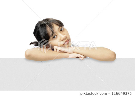 A girl is looking through a white board 116649375