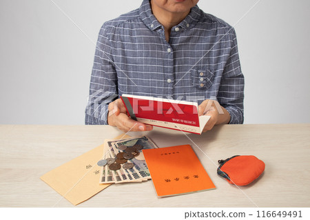 Image of pension book and money Image of pension book and money 116649491