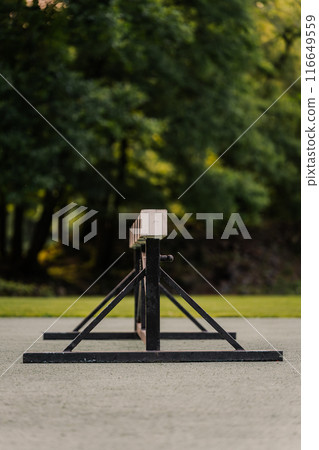 Vertical shot of athletics obstacle course with copy space Vertical shot of athletics obstacle course with copy space 116649559