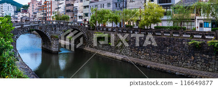 Evening view of Nakajima River and Meganebashi Bridge, panorama [Nagasaki City] 116649877