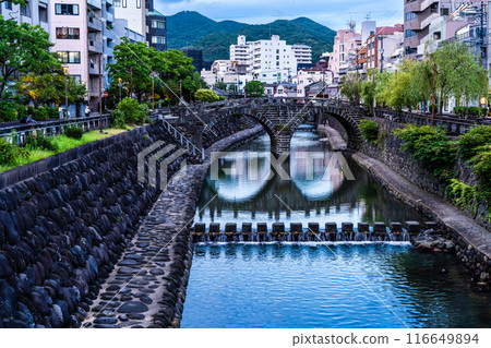 Evening view of Nakajima River and Meganebashi Bridge [Nagasaki City] 116649894