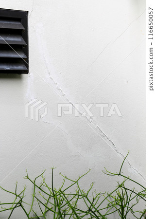 Cracked Textured white Wall Background Cracked Textured white Wall Background 116650057