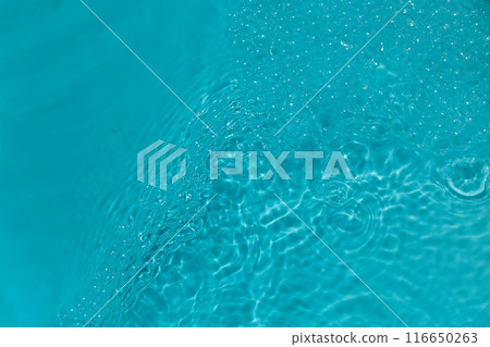 Serene Aquatic Ripples Close-up of bubbles in bright turquoise water. Serene Aquatic Ripples Close-up of bubbles in bright turquoise water. 116650263