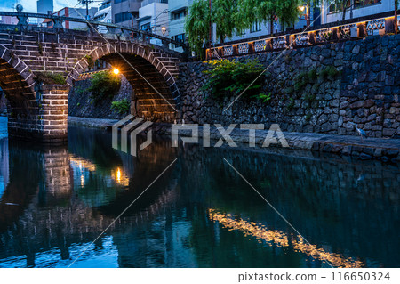 Illuminated night view of Nakajima River and Meganebashi Bridge [Nagasaki City] 116650324