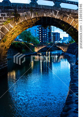 Illuminated night view of Nakajima River and Meganebashi Bridge [Nagasaki City] 116650346