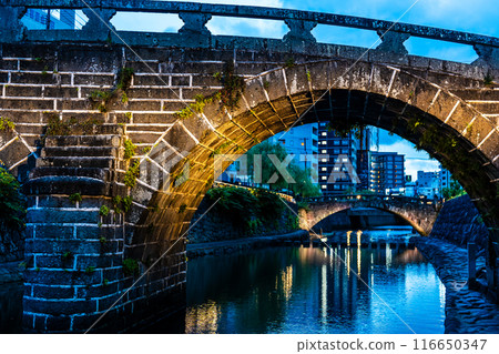 Illuminated night view of Nakajima River and Meganebashi Bridge [Nagasaki City] 116650347