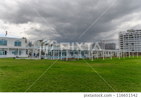 residential complex with white houses on the seashore in Cyprus 4 116651542