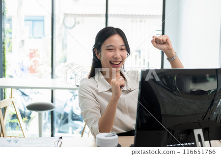 Young woman celebrate successful stock trading Young woman celebrate successful stock trading 116651766