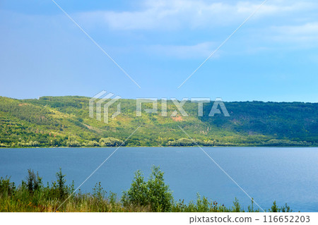 Landscape quiet river bay with hilly green banks in National Park Landscape quiet river bay with hilly green banks in National Park 116652203