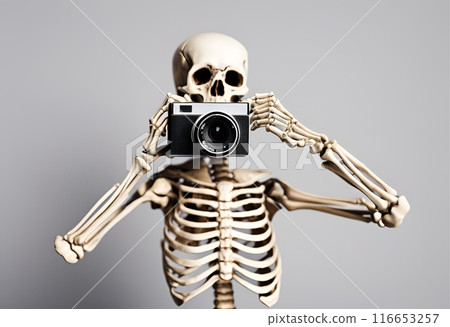 Skeleton holding a camera 116653257