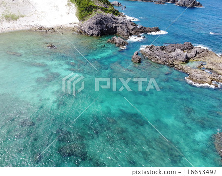 Oura Beach is located on the northeast coast of Shikinejima Island in Tokyo JAPAN and is a sandy and secluded place to relax Oura Beach is located on the northeast coast of Shikinejima Island in Tokyo JAPAN and is a sandy and secluded place to relax 116653492