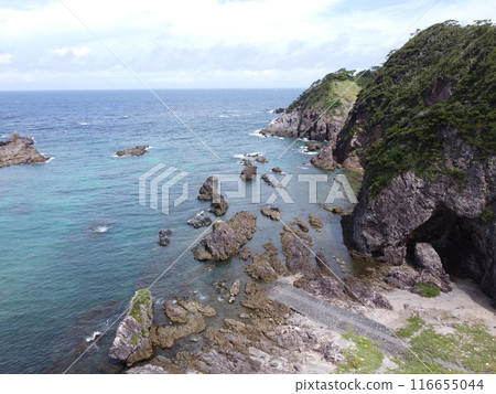The northern corner of Shikinejima Island in Tokyo JAPAN is home to the stunning Tomari Beach. The northern corner of Shikinejima Island in Tokyo JAPAN is home to the stunning Tomari Beach. 116655044