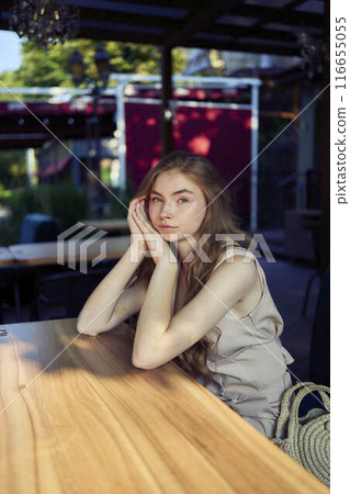 a beautiful teenage girl in a peach fuzz suit with a vest, in the old money style in a fancy restaurant a beautiful teenage girl in a peach fuzz suit with a vest, in the old money style in a fancy restaurant 116655055