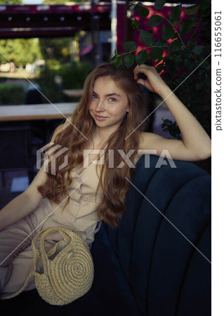 a beautiful teenage girl in a peach fuzz suit with a vest, in the old money style in a fancy restaurant a beautiful teenage girl in a peach fuzz suit with a vest, in the old money style in a fancy restaurant 116655061