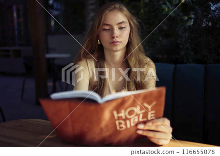 beautiful teenage girl in a peach fluffy suit with a waistcoat in the old money  style reads the Holy Bible and prays beautiful teenage girl in a peach fluffy suit with a waistcoat in the old money  style reads the Holy Bible and prays 116655078