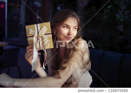 a beautiful teenage girl in peach fuzz suit with vest, old money style with craft gift certificate a beautiful teenage girl in peach fuzz suit with vest, old money style with craft gift certificate 116655080