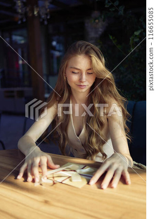 a beautiful teenage girl in peach fuzz suit with vest, old money style with craft gift certificate 116655085
