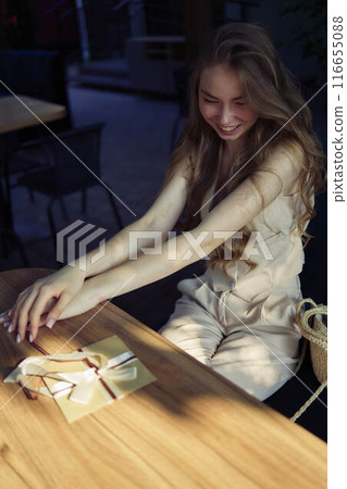 a beautiful teenage girl in peach fuzz suit with vest, old money style with craft gift certificate a beautiful teenage girl in peach fuzz suit with vest, old money style with craft gift certificate 116655088