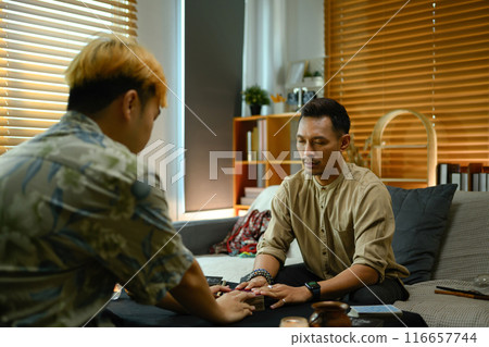 Fortune teller forecasting predicting future for man client. Forecasting and divination concept 116657744