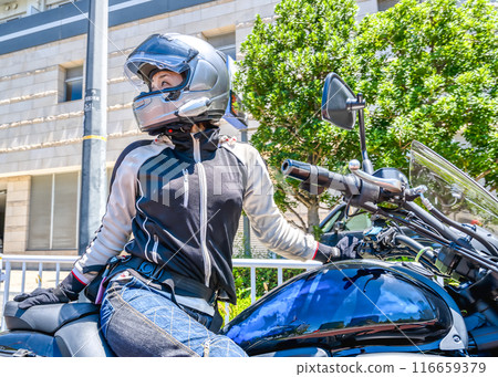Female rider touring Yokohama 116659379