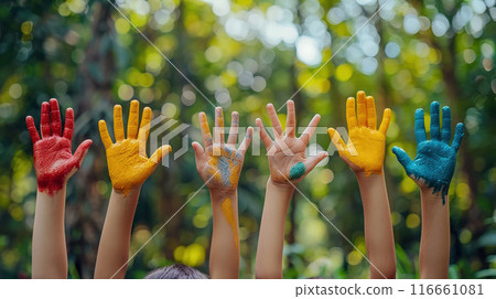 Panoramic view park where multiracial children colorful painted hands playing raising hands up 116661081